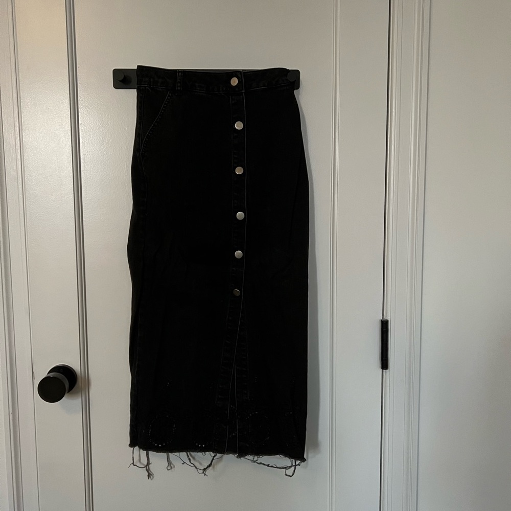 Distressed denim button down front midi skirt with puncture design hem
